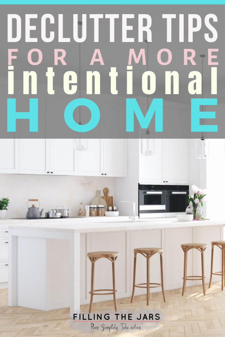 declutter tips text over image of simple white kitchen with wood barstools and wood floor