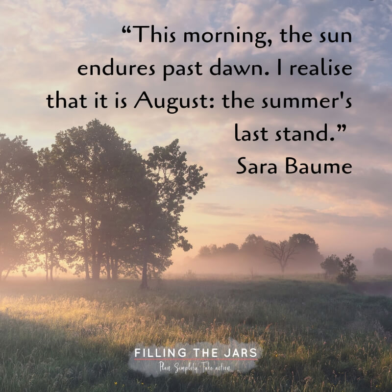 Summer sunrise mist over trees and grass with text overlay quote sara baume august is summer's last stand.