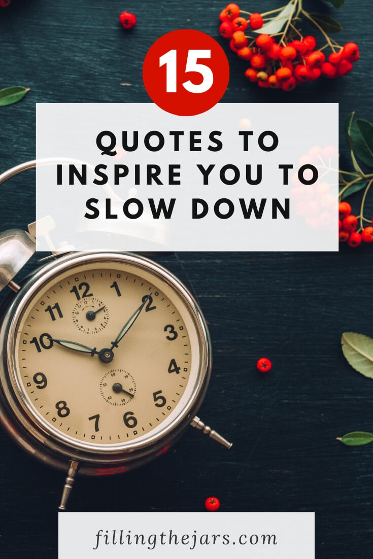 clock and red berries on dark background with white overlay and text 15 quotes to inspire you to slow down