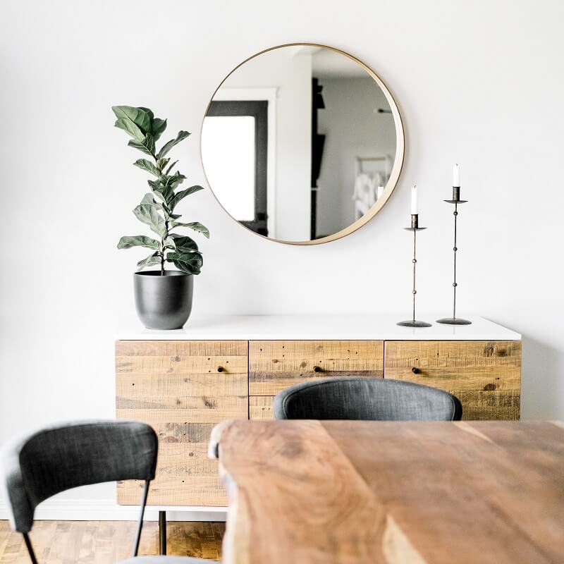 white dining room with minimalist decor after decluttering