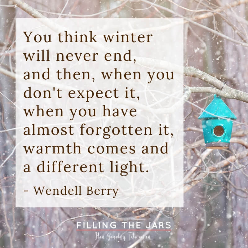 wendell berry you think winter will never end quote on background with trees and falling snow and tuquoise birdhouse