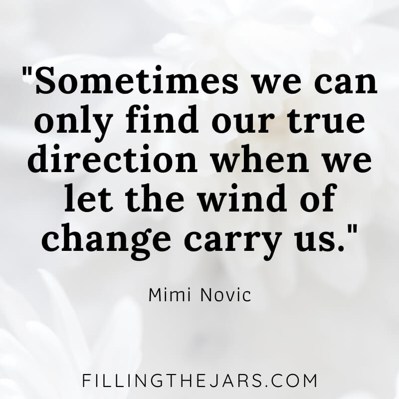 mimi novic wind of change quote on white flower background