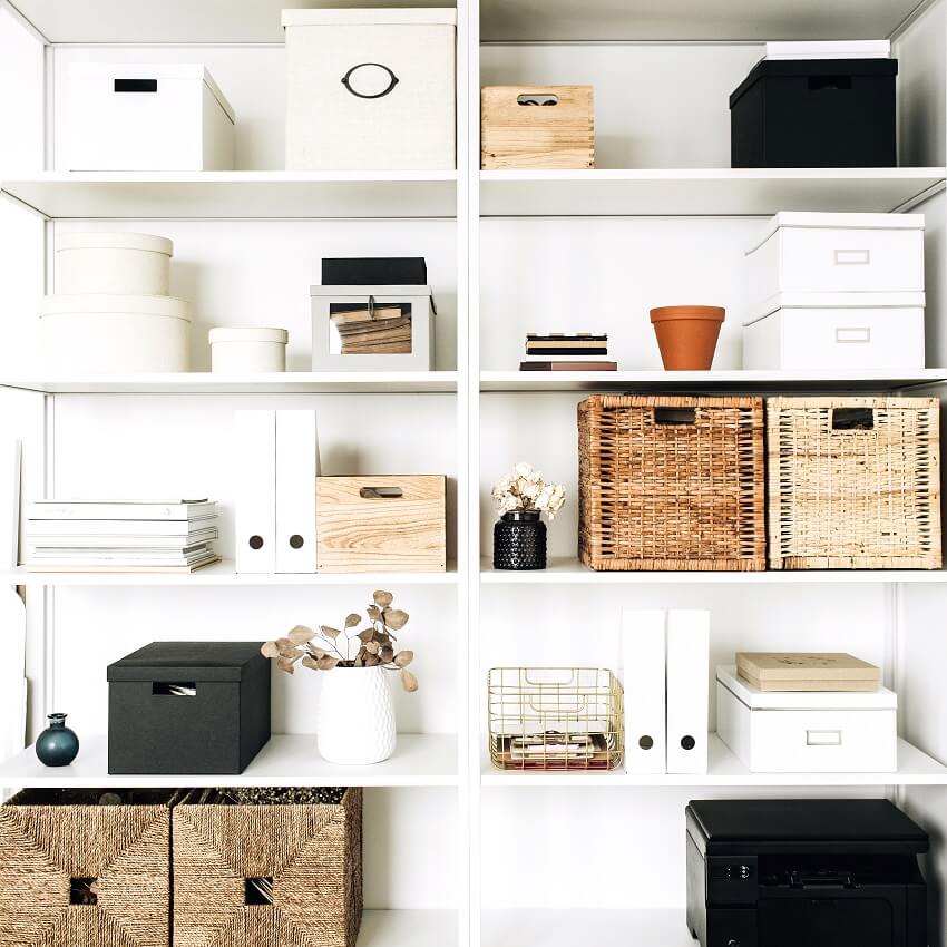 white shelves with various organized storage containers