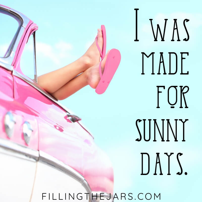 summer sky background with vintage pink car and female legs hanging out with text overlay i was made for sunny days