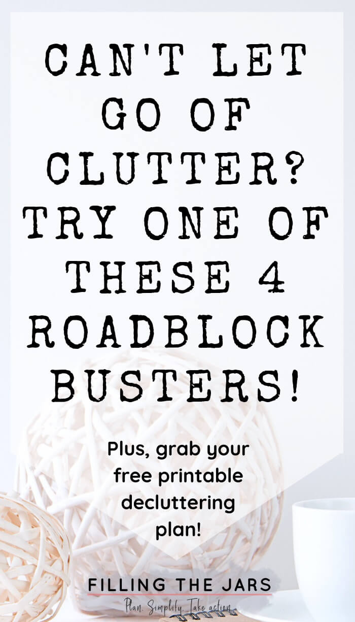 text roadblock busters to let go of clutter on white background over image of rustic white vine balls and white teacup