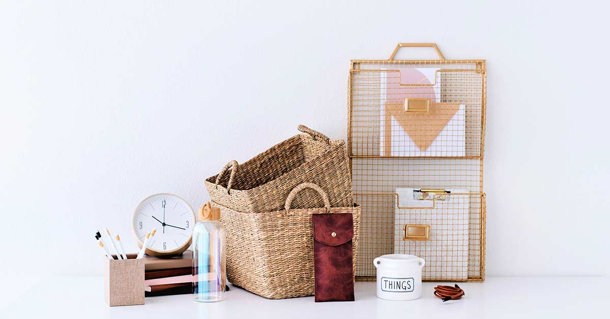 Small assortment of household clutter on white table.