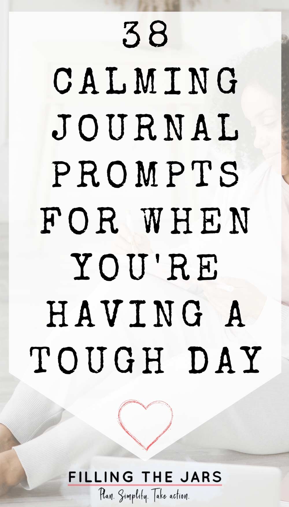 Text calming journal prompts for a tough day on white background over image of woman in pink t-shirt, gray sweater and leggings sitting on bedroom floor while writing pink journal.