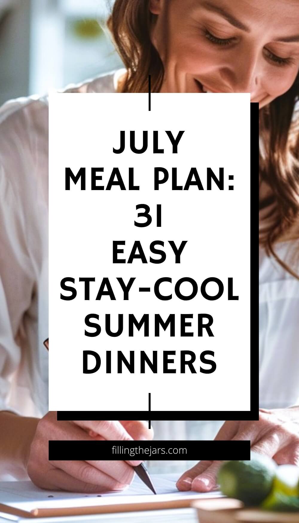 Pinterest image of a woman smiling while writing her July menu plan in a notebook. The overlaid text reads 'July Meal Plan: 31 Easy Stay-Cool Summer Dinners.'